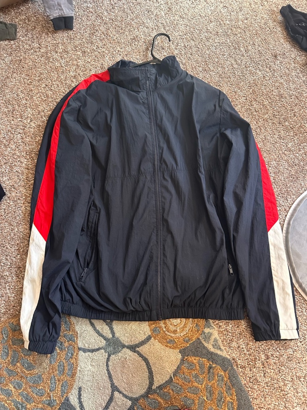 Divided Black Windbreaker with Red and White Sleeve Panels